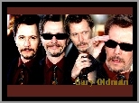 Gary Oldman,okulary, niebieskie oczy