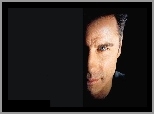 John Travolta,pół twarzy